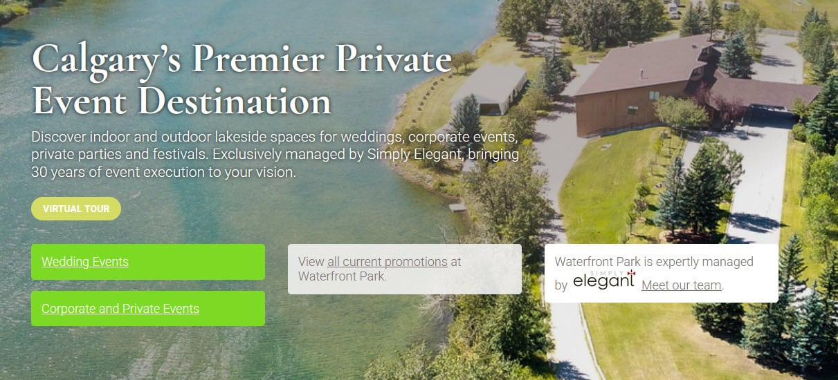 Outdoor, lakeside wedding ceremony setup by the Belvedere with chairs and entry table at Waterfront Park in Calgary